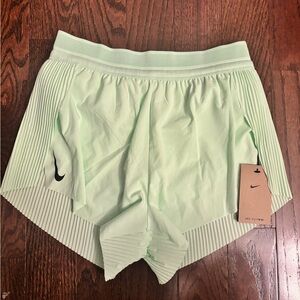 Mint green Nike Aeroswift shorts